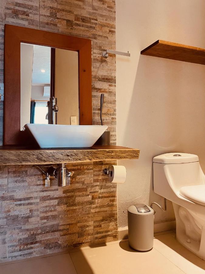Hotel Manglar Suites Mahahual Bagian luar foto