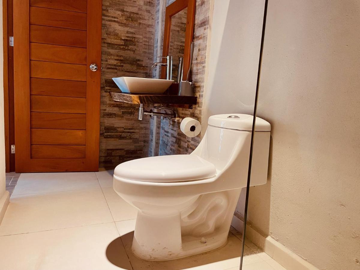 Hotel Manglar Suites Mahahual Bagian luar foto
